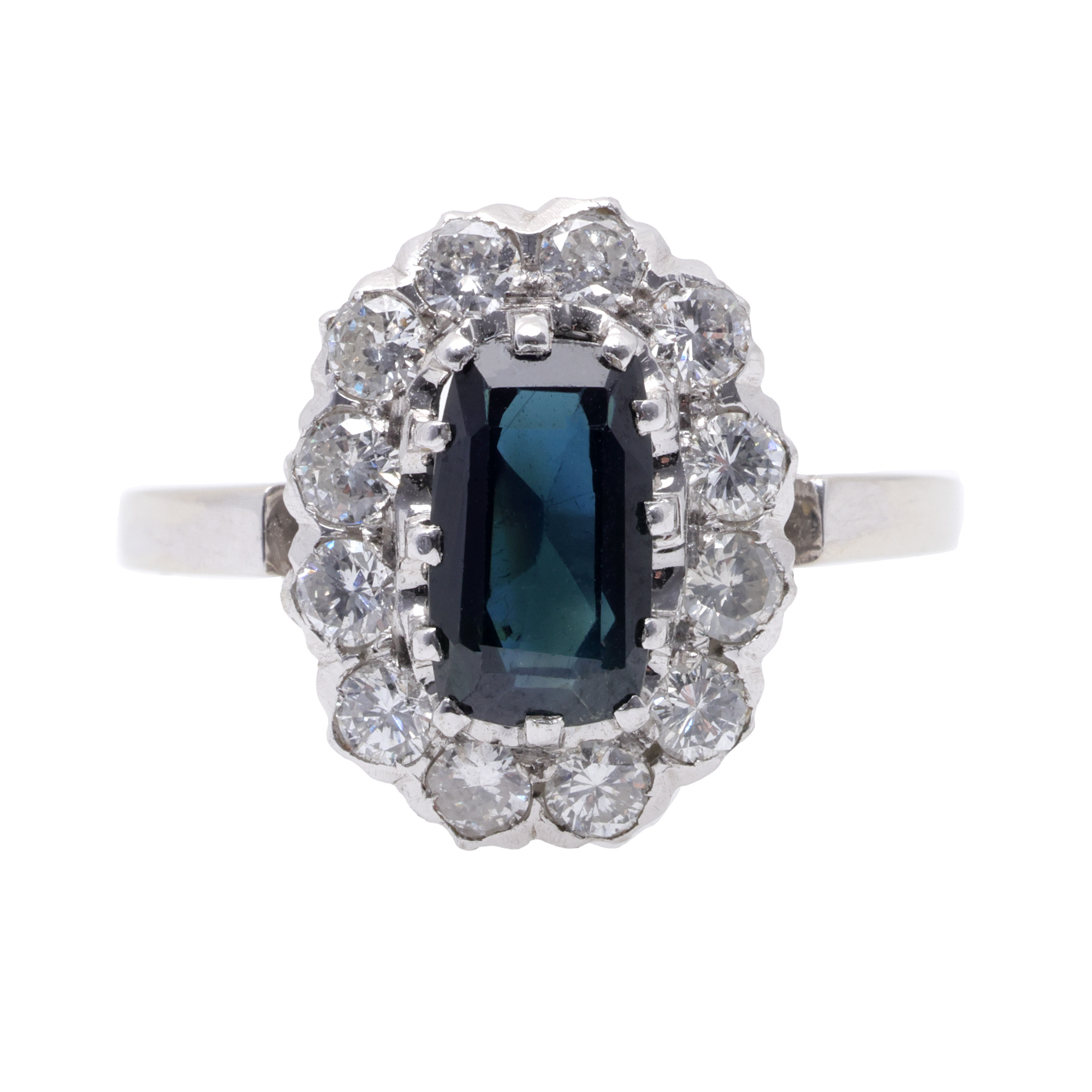 White gold ring, centrally adorned with sapphire surrounded by diamonds