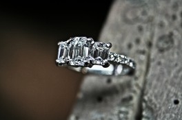 EMERALD CUT THREE STONE DIAMOND RING IN PALLADIUM