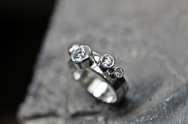 Unusual rub over diamond setting