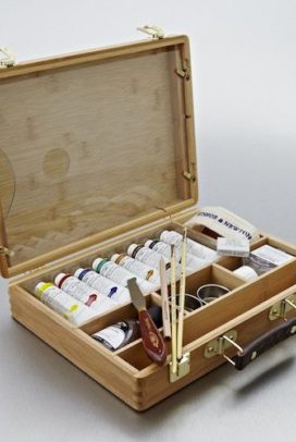 Painting Pink Poodles and Other Creatures with acrylic paint set that arrived confidently in a wooden briefcase
