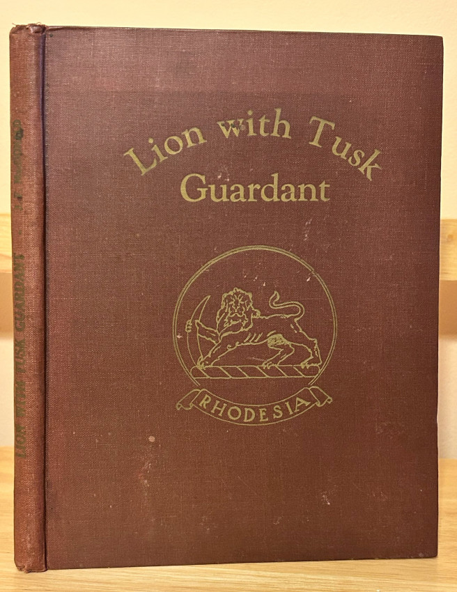 LION WITH TUSK GUARDANT