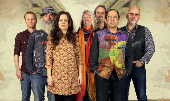Seven members of Steeleye Span stand facing the camera