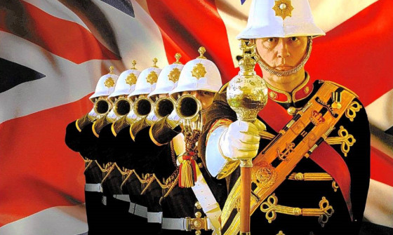 The Royal Marines stand in a uniform line in front of a Union Jack flag.