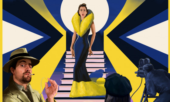 An actress walks down a staircase in an elegant yellow and blue gown. She is on set, with a detective and camerawoman at the bottom of the stairs.