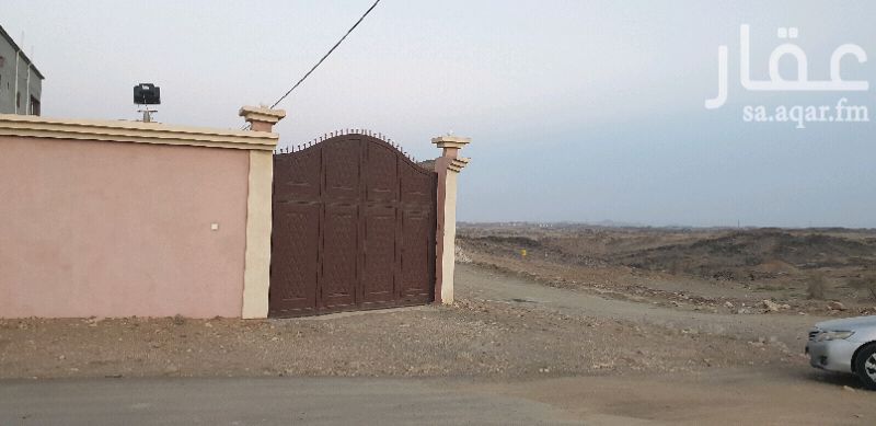 1157748 ارض محوشه على شارعين بصك فيها بيت شعبي وخزان