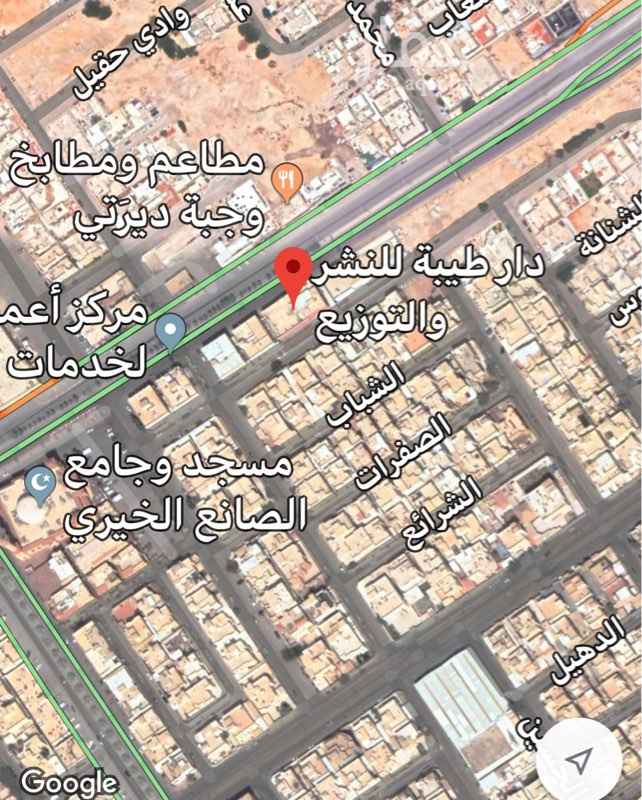 1753653 مبنى قائم هو مكتبة طيبة للنشر على شارعين متظاهرين شمالي وجنوبي ١٥