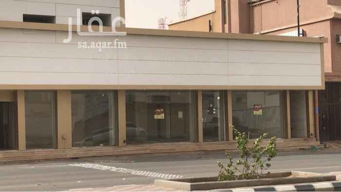 1235815 محل اربع فتحات على شارع 13 واجهه كلاديج الابواب مركبة