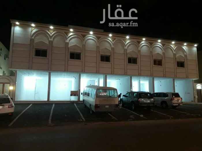 1289815 عماره للبيع يوجد بها ٨ شقق ثلاث غرف وصاله و٧ محلات تجاريه شاره ٣٦ غربي مخطط ٣٨