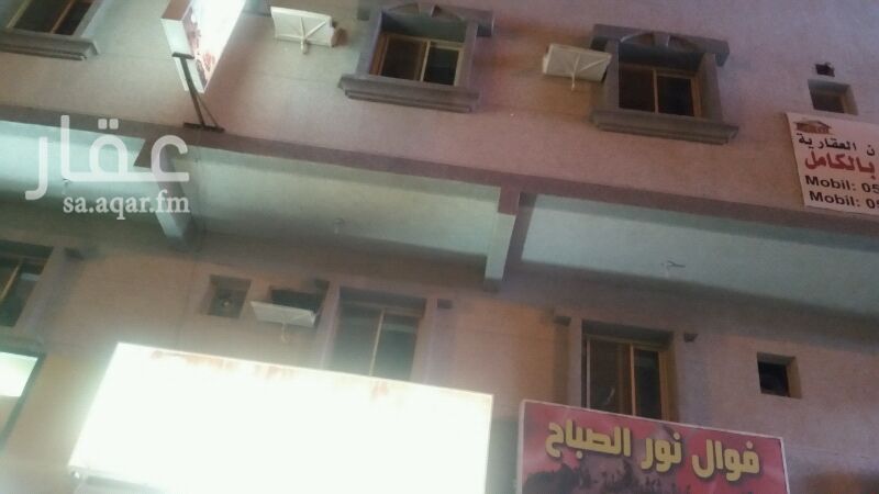 573718 عمارة مجهزة شقق مفروشة 14سويت بدون اثاث . موقع استراتيجي . يوجد مضخة ومكتب استقبال ممكن الاجار مفرق للعزاب
