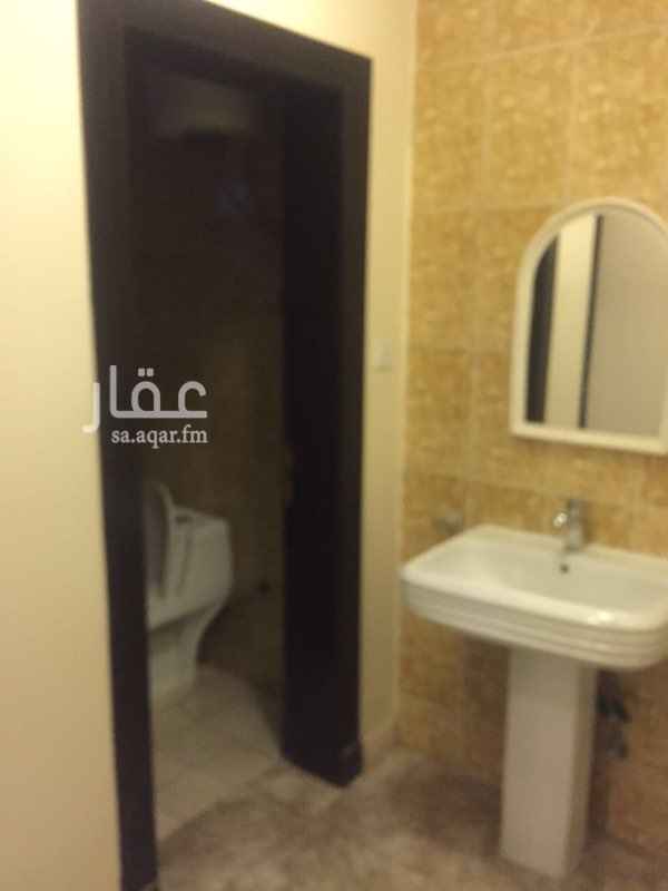 1594954 شقه في الدور الارضي في عمارة شبه جديده حي المنار شارع قندهار