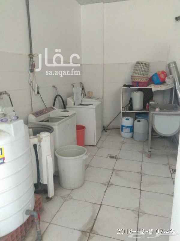 1362347 مغسلة ملابس للتقبيل