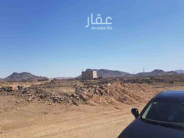 1580102 فرصه استثمارية مميزة ارض مساحتها ١٢٨الف متر علي طريق الرياض القصيم قبل نقطة التفتيش واجهه علي الشارع ٦٥متر بها بئر مياه ٣٠متر