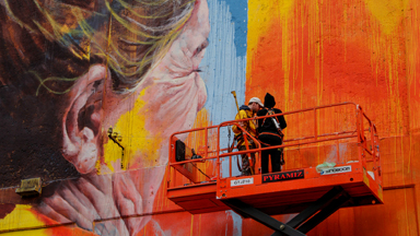 Street Artist Creates Giant Mural To Raise Recycling Awareness