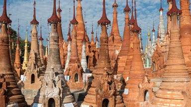 Explore the crumbling and gold plated towers of ancient Burmese villages