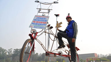 Cyclist Gunning For New World Record On Giant Bike