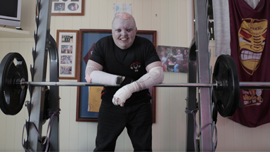 The Bodybuilder With Butterfly Skin