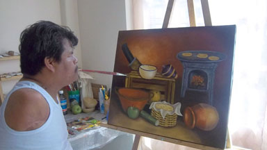 Work of art: Inspiring armless artist creates masterpieces with just his mouth