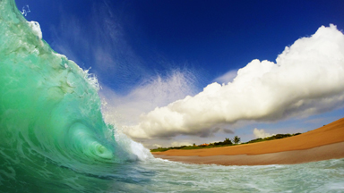 Making waves: Daring photographer braves wild surf to capture ocean waves from beneath the surface
