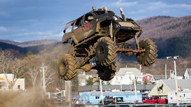 Mud, Sweat, and Gears: Monster Truck Drivers Hit The Dirt Track