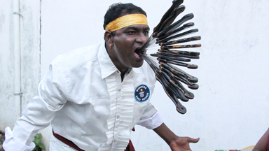 What a mouthful! Meet the record breaking sword swallower