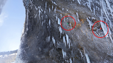 Climbers Scale Frozen Wall Behind 450ft Waterfall