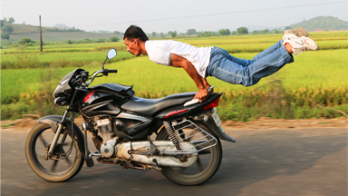 High Octane Yoga: Indian Man Pulls Yoga Poses On Speeding Motorbike