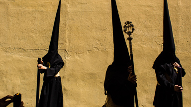Pious Parade: Colourful Catholic brotherhoods flock to the streets for Holy Week procession