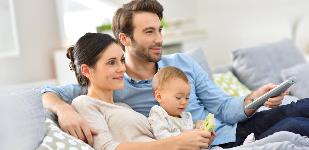 family enjoying digital entertainment