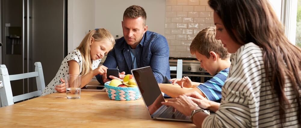 Family enjoying devices