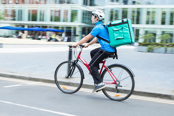 Courier on bike