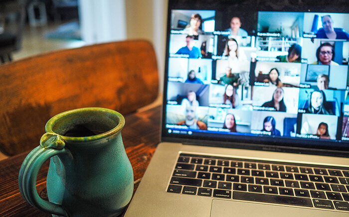 Coffee on desk with laptop