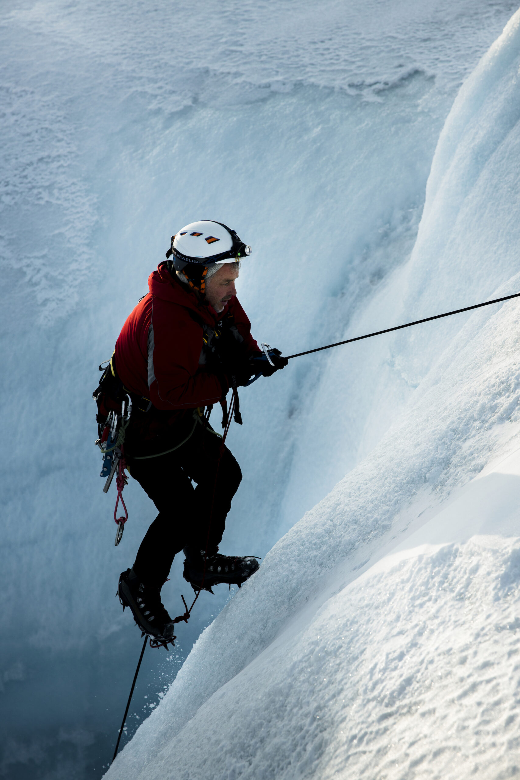 Alun-Hubbard-climbing-down-into-the-moulin