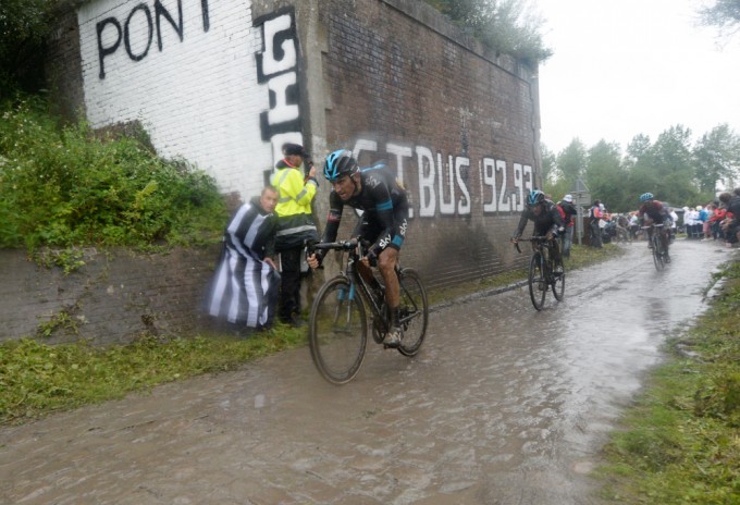 Geraint Thomas leads Richie Porte, who also suffered a crash, on to the final section of cobbles as the two looked to put time into Alberto Contador and claw back Vincenzo Nibali's advantage (pic: Bruno Bade/ASO) 