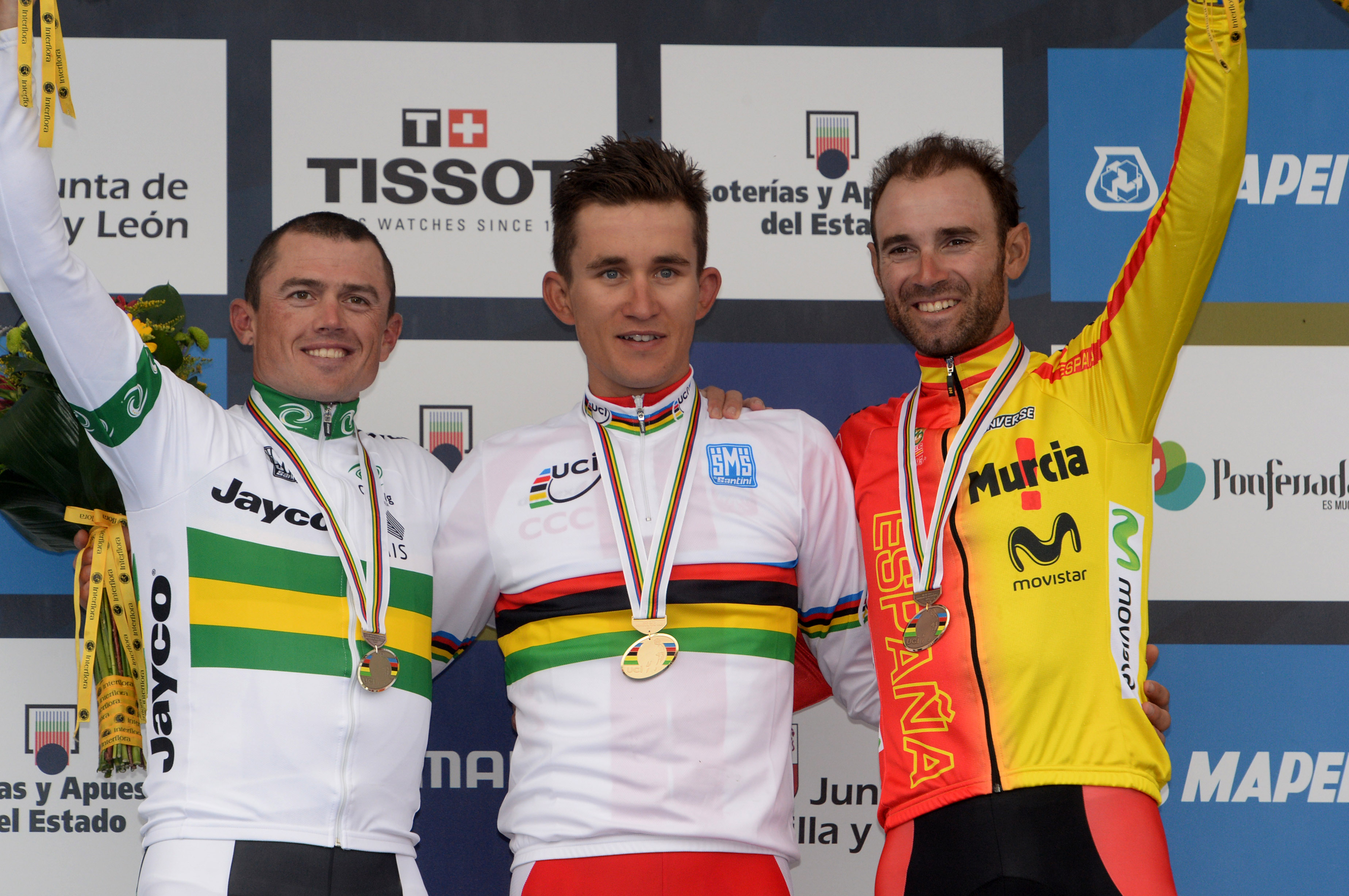 Simon Gerrans (links), Kwiatkowski (mitte) und Alejandro Valverde (rechts) auf dem Podium der UCI Weltmeisterschaft 2014. (Foto: Sirotti)