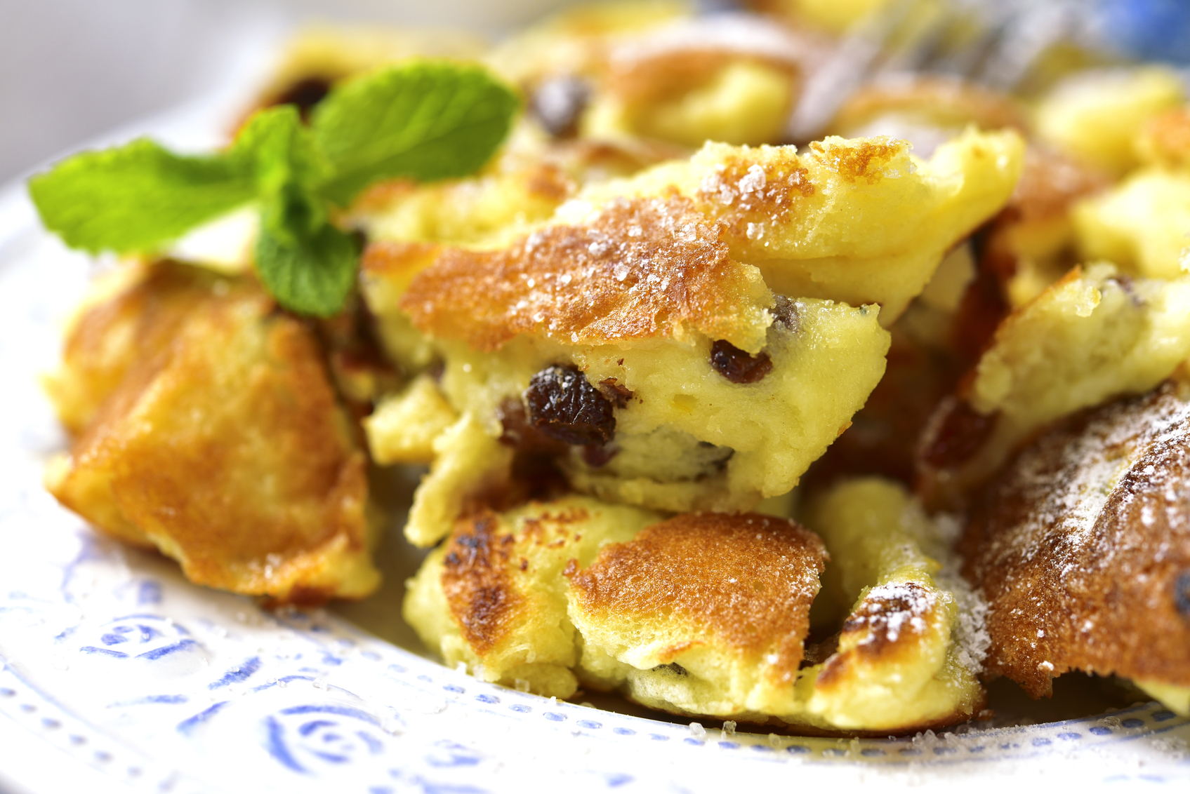 Kaiserschmarrn - traditional austrian pancake dessert with raisins.