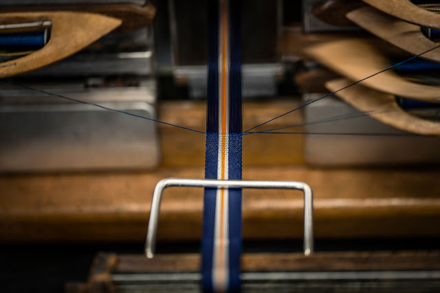 12.TUDOR-Fabric-Straps_weaving-the-Heritage-Chrono-Blue-strap-on-antique-Jacquard-loom.jpeg