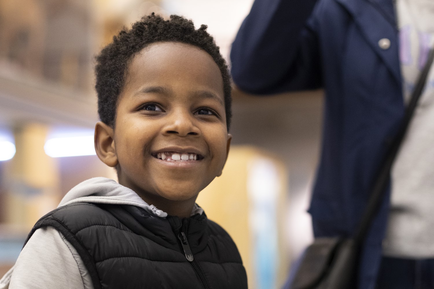 Boy smiling at a museum.