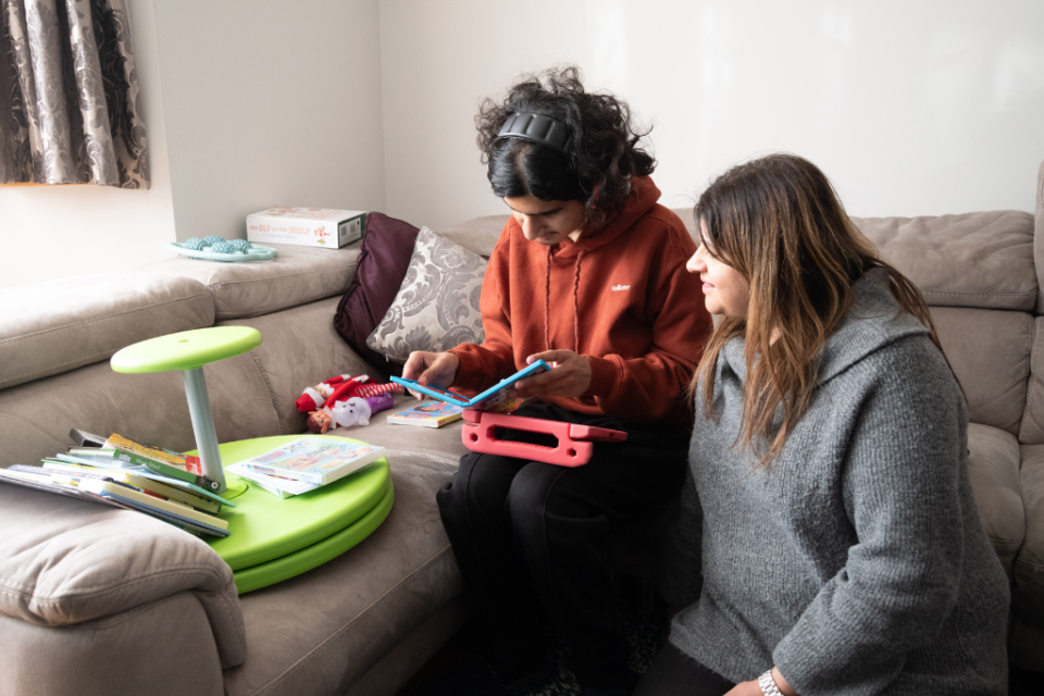 Strengths and support needs: A mum and her son read together
