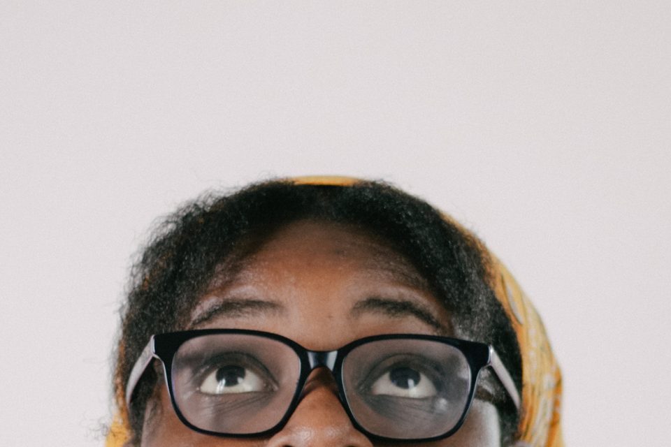 ADHD and autism: a close up of a woman's face as she looks up