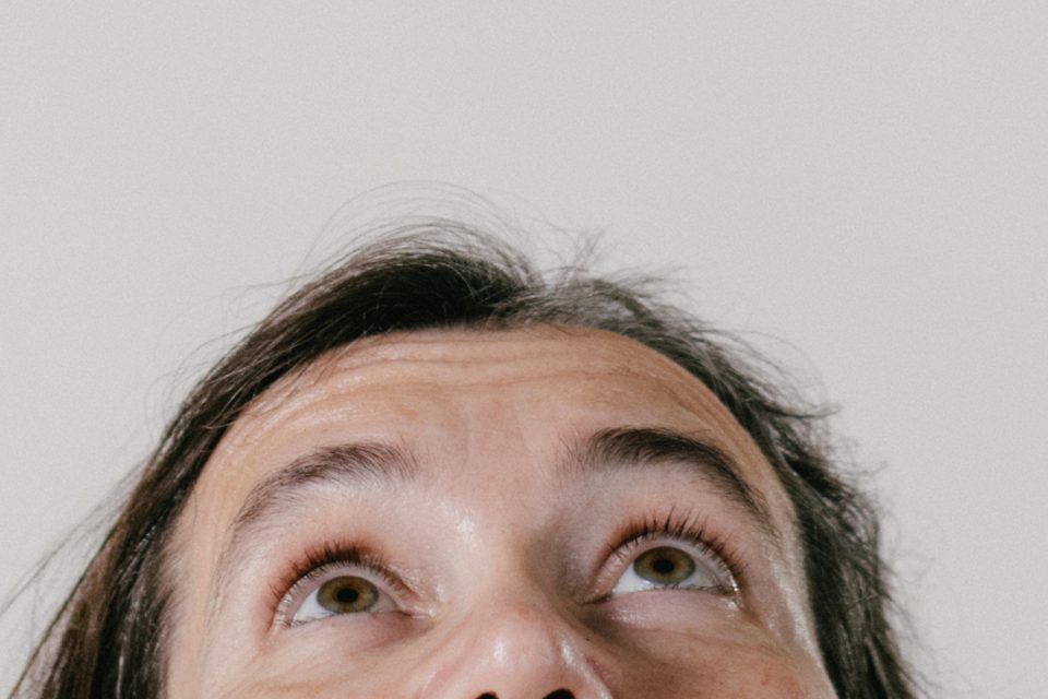 Suicide and autism: a close up of a woman looking up