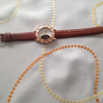 Damenuhr braun, in Schlangenlederoptik, neu