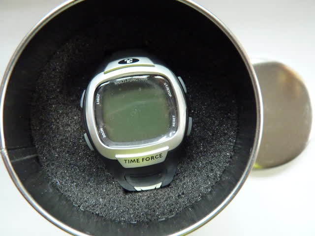 sportliche  graue Time-Forceuhr in Originalblechbüchse