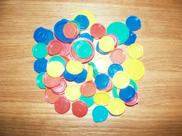Verschiedene Smarties-Deckeli (gross + klein)
