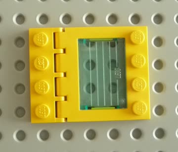 gelbes Lego Autodach mit Dachfenster