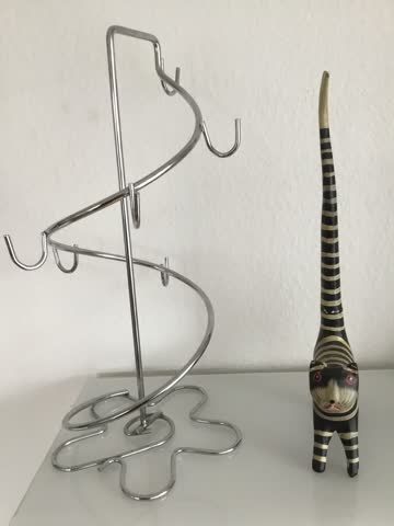 Kettenträger-Spirale und Ringhalter-Katze