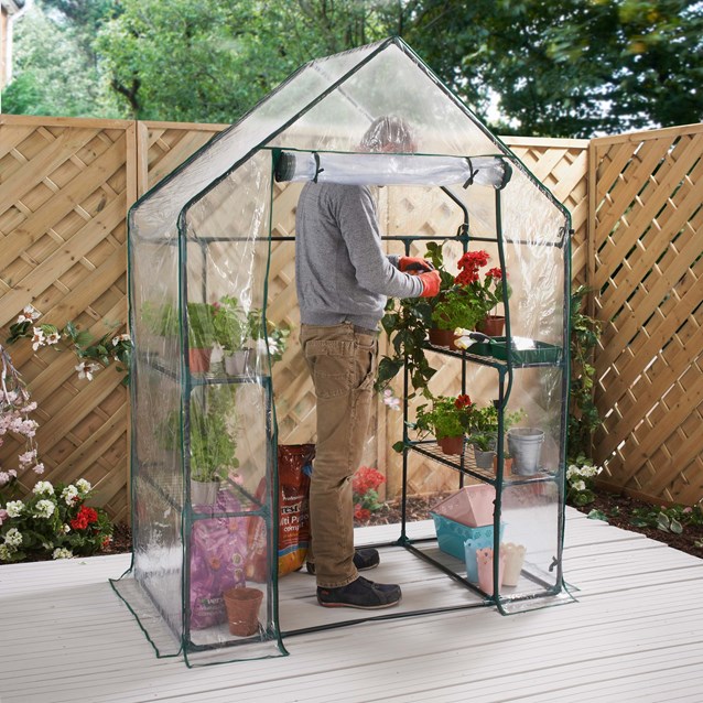 Walk In PVC Plastic Garden Greenhouse W/ 4 Shelves Walk In PVC Plastic Garden Greenhouse W/ 4 Shelves
