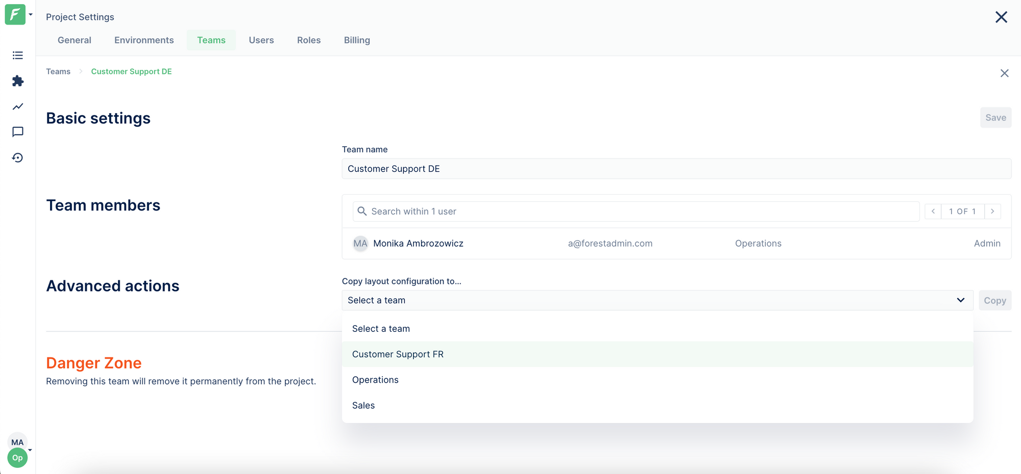 The propagation of a layout configuration from one Forest Admin team to another.