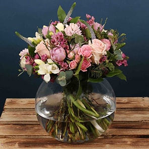 A beautiful Mother's Day Posie made up of a combination of pink flowers. The beautiful bright flowers that make up this arrangement would make it look amazing in any home.  We offer flower delivery Dublin.