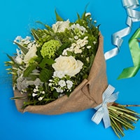 Bloom Magic - Flower Delivery Ireland - Simplicity is pure and gorgeous. This bouquet features white roses and the freshest seasonal white blooms available. Artfully hand-tied with luxurious greenery, this bouquet is perfect for any occasion.