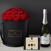 Bloom Magic - Flower Delivery Ireland - This hatbox flower arrangement features stunning red roses immaculately arrange and presented in a choice of either a matte black or pearl white large hatbox. this arrangement is the perfect gift, especially if you are looking for some Valentines flowers to make that someone special feel amazing. We offer same day delivery for this arrangement to anywhere in Dublin, and next day delivery to anywhere in Ireland.